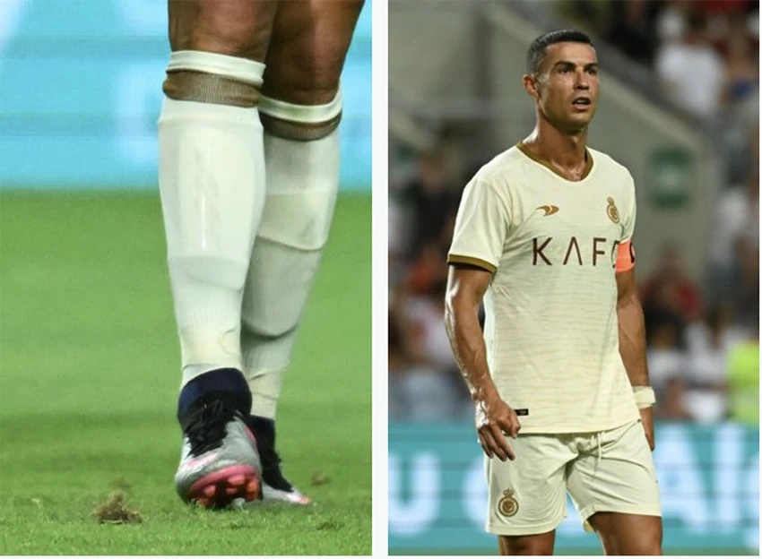 Người hâm mộ tinh mắt phát hiện ra Ronaldo mang miếng bảo vệ chân của hãng Adidas. ẢNH: GETTY Người hâm mộ tinh mắt phát hiện ra Ronaldo mang miếng bảo vệ chân của hãng Adidas. ẢNH: GETTY