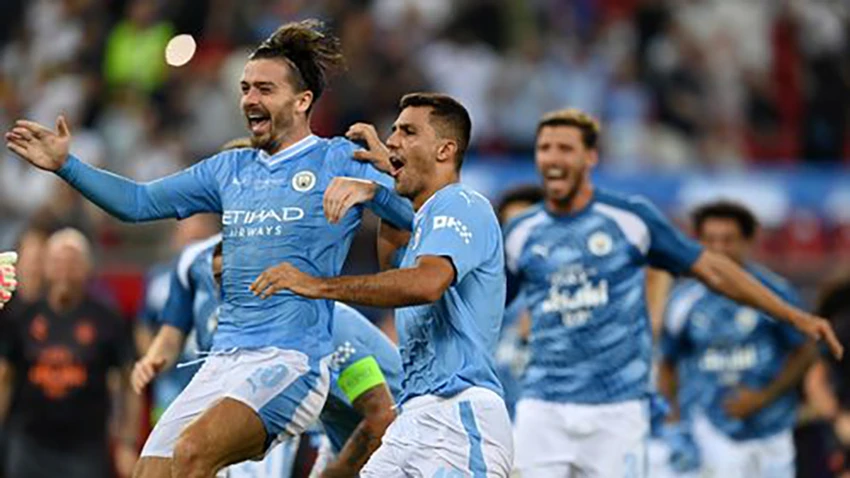 Jack Grealish và các đồng đội ở Man City vui mừng sau khi thắng Sevilla trong loạt sút luân lưu. ẢNH: GETTY Jack Grealish và các đồng đội ở Man City vui mừng sau khi thắng Sevilla trong loạt sút luân lưu. ẢNH: GETTY