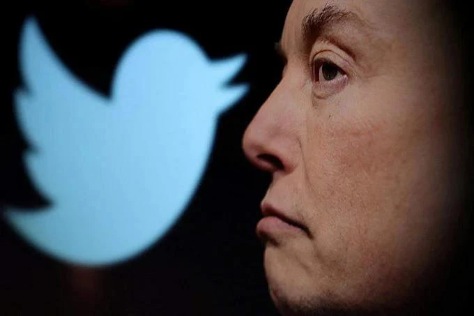 Tỉ phú Elon Musk và logo Twitter. Ảnh: REUTERS Tỉ phú Elon Musk và logo Twitter. Ảnh: REUTERS