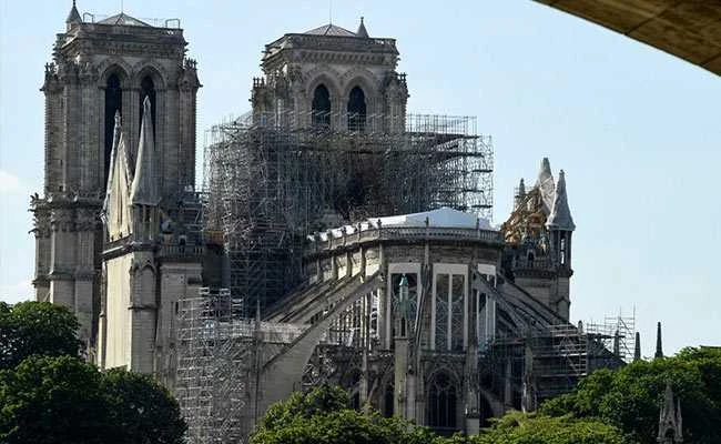 Ngọn tháp bị cháy của Nhà thờ Đức Bà Paris đang trong quá trình xây dựng lại. Ảnh: AFP Ngọn tháp bị cháy của Nhà thờ Đức Bà Paris đang trong quá trình xây dựng lại. Ảnh: AFP