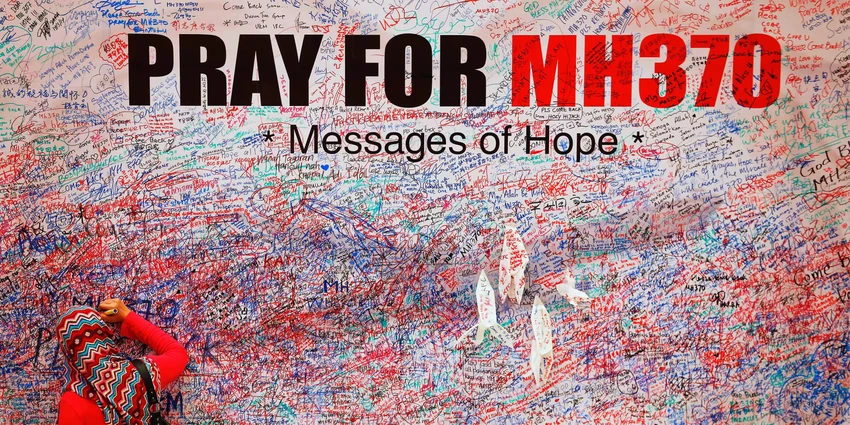 Bức tường để lại lời nhắn cho các hành khách trên chuyến bay MH370 ở trung tâm Kuala Lumpur. Ảnh: REUTERS