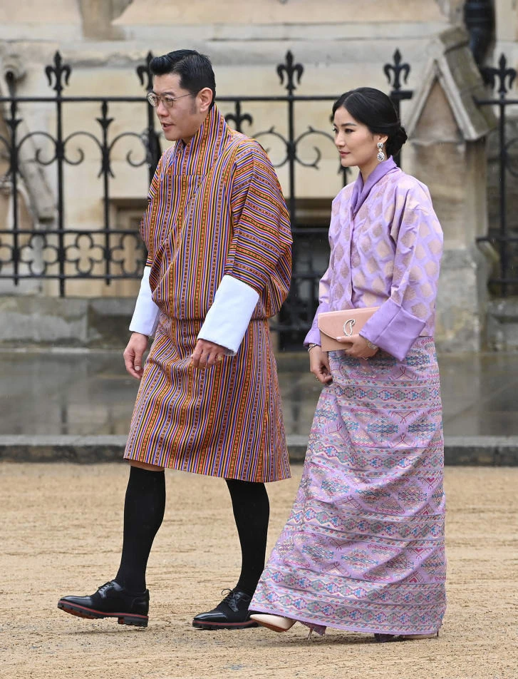 Vua Jigme Khesar Namgyel Wangchuck và Hoàng hậu Jetsun Pema của Bhutan đến dự lễ trong trang phục truyền thống của đất nước. Ảnh: GETTY IMAGES Vua Jigme Khesar Namgyel Wangchuck và Hoàng hậu Jetsun Pema của Bhutan đến dự lễ trong trang phục truyền thống của đất nước. Ảnh: GETTY IMAGES