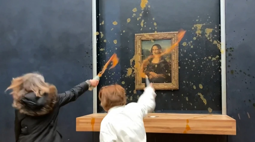 người biểu tình ném súp vào tranh nàng Mona Lisa